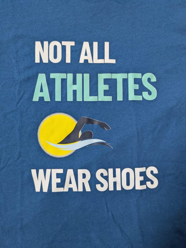 blue shirt Not All Athletes wear shoes